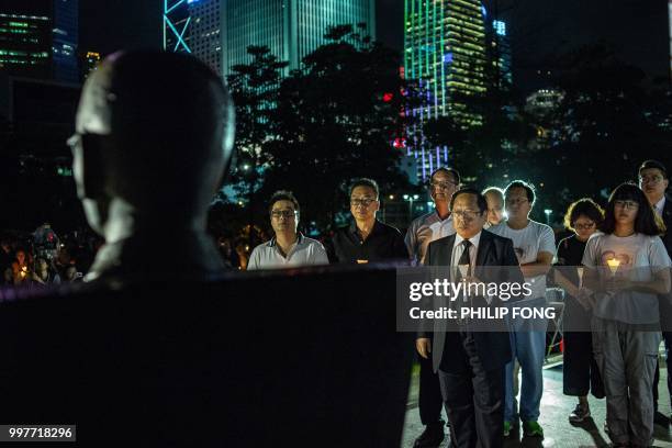 Hong Kong pro-democracy lawmaker Albert Ho Chun-yan attends a memorial event outside Tamar Park in Hong Kong on July 13 to mark the first anniversary...