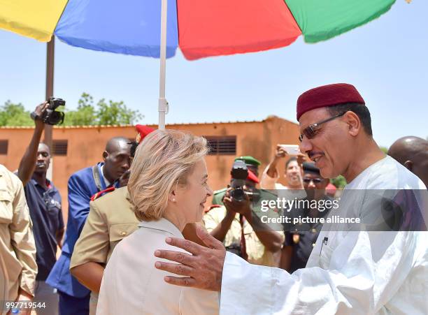 German Defence Minister Ursula von der Leyen meeting Nigerien Minister of the Interior Mohamed Bazoum for the handover of motorcycles, cargo trucks...