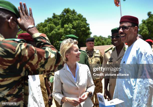 German Defence Minister Ursula von der Leyen meeting Nigerien Minister of the Interior Mohamed Bazoum for the handover of motorcycles, cargo trucks...