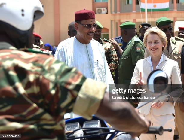 German Defence Minister Ursula von der Leyen meeting Nigerien Minister of the Interior Mohamed Bazoum for the handover of motorcycles, cargo trucks...