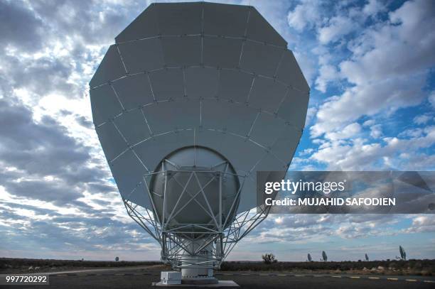 View of one of a 64-dish radio telescope system is seen during an official unveiling ceremony on July 13, 2018 in Carnarvon. South Africa on July 13...