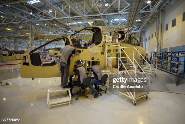 Staff of Turkish Aerospace Industries Inc. Work on a helicopter in Ankara, Turkey on July 13, 2018. Turkey and Pakistan signed a deal for the sale of...