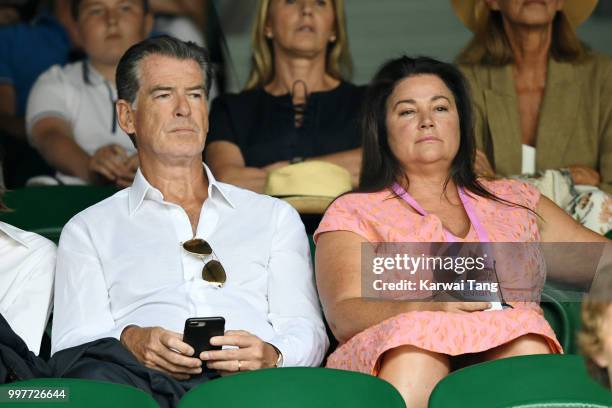 Pierce Brosnan and his wife Keely Shaye Smith attend day eleven of the Wimbledon Tennis Championships at the All England Lawn Tennis and Croquet Club...