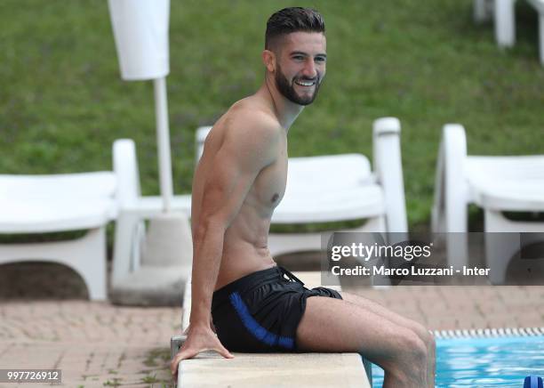 Roberto Gagliardini of FC Internazionale sits in the swimming pool during the FC Internazionale training camp at the club's training ground Suning...