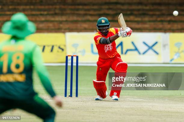 Zimbabwe's batsman Tarisai Musakanda plays a shot during the first one day international cricket match between Pakistan and Zimbabwe at Queens Sports...