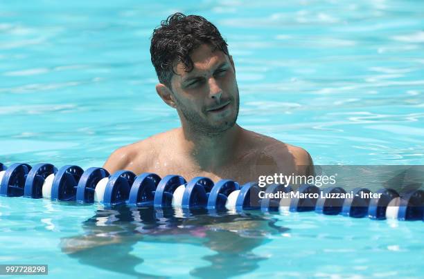 Andrea Ranocchia of FC Internazionale in the swimming pool during the FC Internazionale training camp at the club's training ground Suning Training...