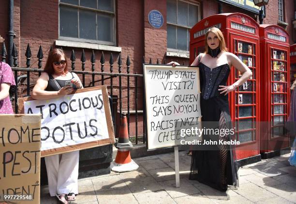 Demonstrator with an anti Trump placard attends the Drag Protest Parade LGBTQi March against Trump on July 13, 2018 in London, United Kingdom. Drag...