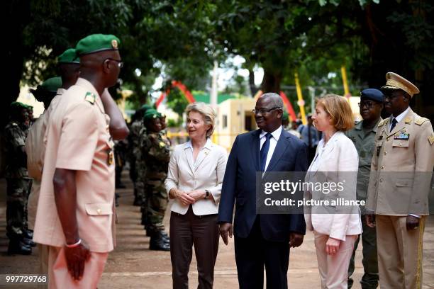 German Defence Ministe Ursula von der Leyen and her French counterpart Florence Parly being received with military honours by their Malian...