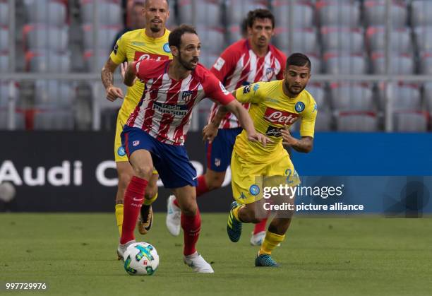 Madrid's Juanfran and Napoli's Lorenzo Insigne vie for the ball during the Audi Cup semi-final match pitting Atletico Madrid vs SSC Napoli in the...