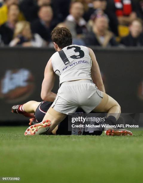 Jed Lamb of the Blues and Jade Gresham of the Saints wrestle during the 2018 AFL round 17 match between the St Kilda Saints and the Carlton Blues at...