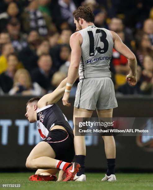 Jed Lamb of the Blues and Jade Gresham of the Saints wrestle during the 2018 AFL round 17 match between the St Kilda Saints and the Carlton Blues at...