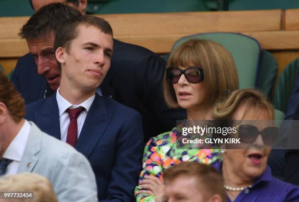 British-American journalist and editor, Anna Wintour sits in the Royal box on Centre Court to watch US player John Isner play South Africa's Kevin...