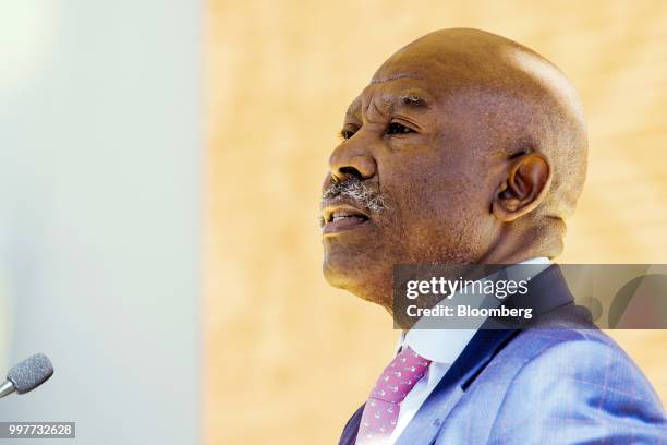 Lesetja Kganyago, governor of South Africa's reserve bank, speaks during a news conference to unveil commemorative banknotes and coins in Pretoria,...