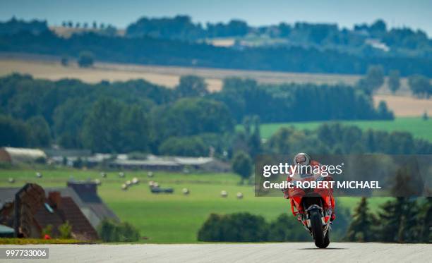 Ducati Team's Spanish rider Jorge Lorenzo steers his bike during the second training session of the Moto GP for the Grand Prix of Germany at the...