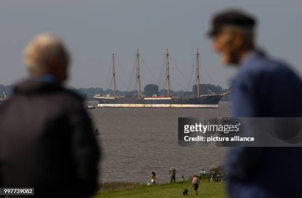 The "Peking" museum ship being towed by two tugs along the Elbe where it meets the Stor river near Wewelsfleth, Germany, 02 August 2017. The...