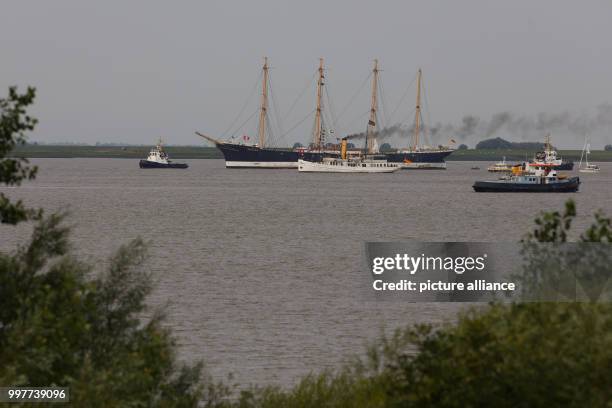 The "Peking" museum ship being towed by two tugs along the Elbe where it meets the Stor river near Wewelsfleth, Germany, 02 August 2017. The...