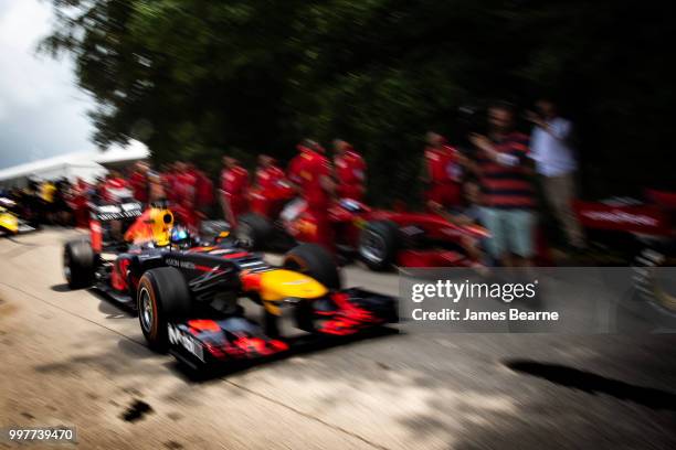 Patrick Friesacher of Austria drives the Red Bull Racing RB8 during the Goodwood Festival of Speed at Goodwood on July 13, 2018 in Chichester,...