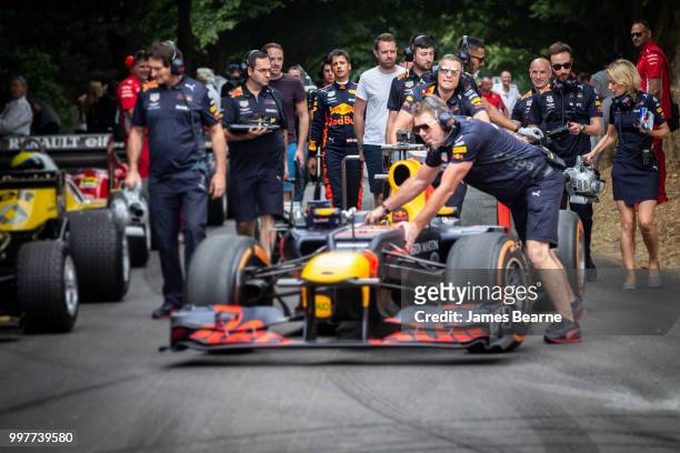 The Red Bull Racing team prepare the RB8 for a run during the Goodwood Festival of Speed at Goodwood on July 13, 2018 in Chichester, England.