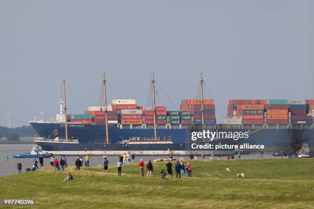 The "Peking" museum ship and the container ship CCNI Arauco meet along the Elbe where it meets the Stor river near Wewelsfleth, Germany, 02 August...