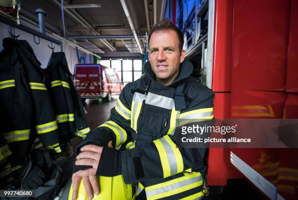 Picture of former professional soccer player and currently firefighter Christian Mikolajczak taken in a fire station in Oberhausen, Germany, 04 May...