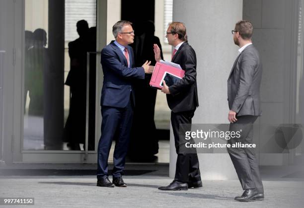 German Transport Minister Alexander Dobrindt being received in front of the Federal Ministry of the Interior by an employee of the Ministry in...