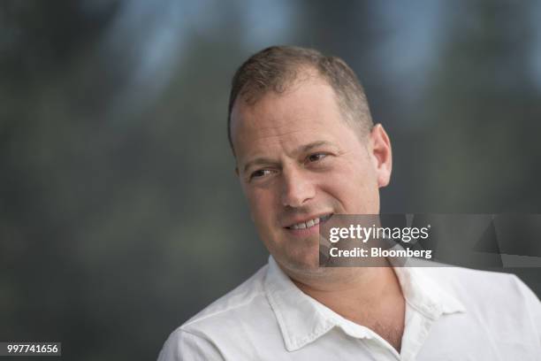 Joey Levin, chief executive officer of IAC/InterActiveCorp, listens during a Bloomberg Television interview at the Allen & Co. Media and Technology...