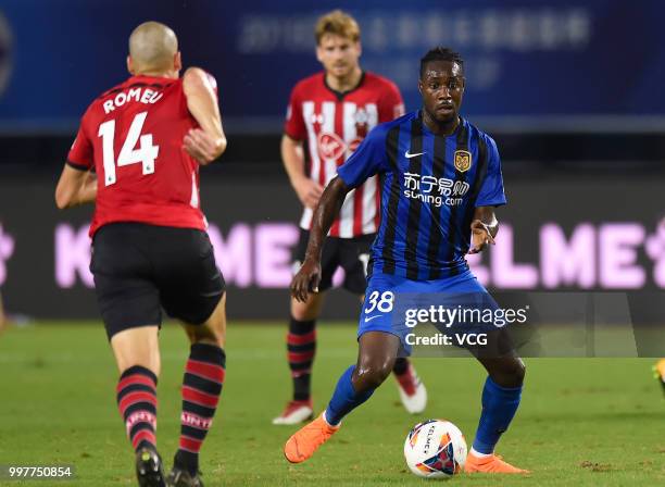 Richmond Boakye of Jiangsu Suning drives the ball during the 2018 Clubs Super Cup match between Southampton FC and Jiangsu Suning FC at Xuzhou...