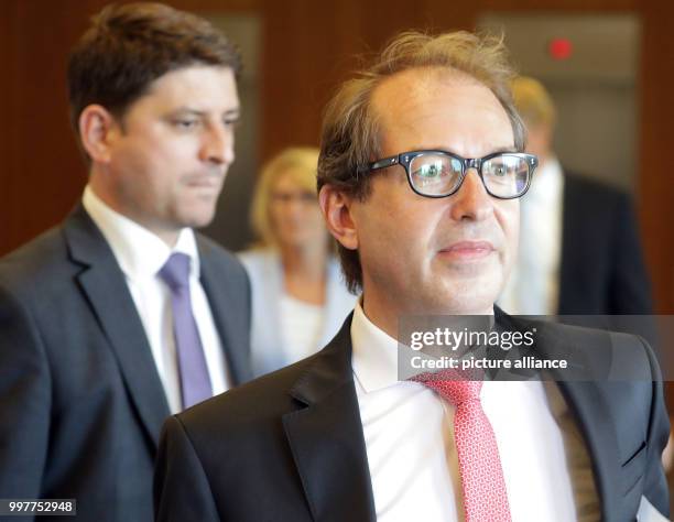 German Minister of Transport Alexander Dobrindt comes out of the Federal Ministry of the Interior after a summit on diesel and the reduction of...