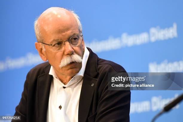 Dieter Zetsche, chairman of the board at Daimler AG, speaks after a summit on diesel in the Federal Ministry of Transport in Berlin, Germany, on 2...