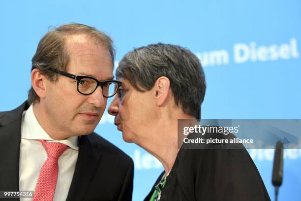 German Minister of Transport Alexander Dobrindt and Minister of the Enviroment Barbara Hendricks speak after a summit on diesel in the Federal...