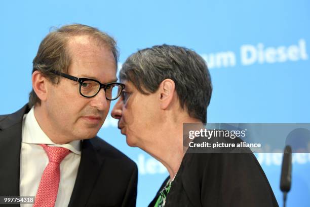 Dpatop - German Minister of Transport Alexander Dobrindt and Minister of the Enviroment Barbara Hendricks speak after a summit on diesel in the...