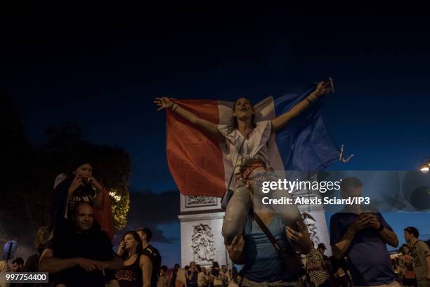 French people are reunited on the Champs Elysees to celebrate the victory of the French soccer team against Belgium in the semi finale of the World...