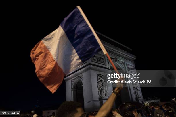 French people are reunited on the Champs Elysees to celebrate the victory of the French soccer team against Belgium in the semi finale of the World...