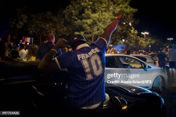 French people are reunited on the Champs Elysees to celebrate the victory of the French soccer team against Belgium in the semi finale of the World...