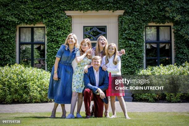 King Willem-Alexander and Queen Maxima with Princesses Alexia, Amalia and Ariane pose during the annual family photo shoot in Wassenaar, on July 13,...