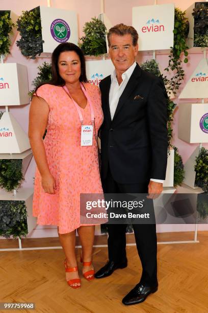 Keely Shaye Smith and Pierce Brosnan attend the Evian Live Young Suite at The Championship at Wimbledon on July 13, 2018 in London, England.