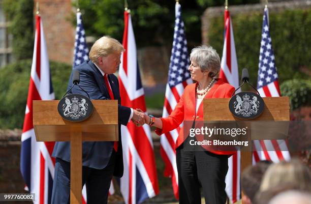 President Donald Trump, left, shakes hands with Theresa May, U.K. Prime minister, during their joint news conference at Chequers in Aylesbury, U.K.,...