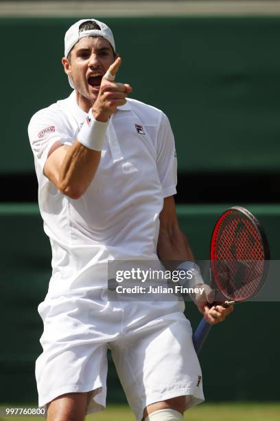 John Isner of The United States celebrates winning the second set against Kevin Anderson of South Africa during their Men's Singles semi-final match...