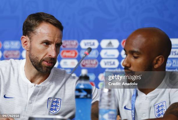 Head coach Gareth Southgate and Fabian Delph of England hold a press conference at Saint Petersburg Stadium ahead of the World Cup third-place...