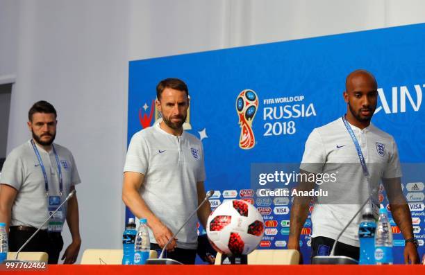 Head coach Gareth Southgate and Fabian Delph of England hold a press conference at Saint Petersburg Stadium ahead of the World Cup third-place...
