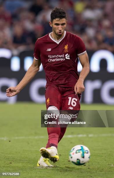 Liverpool's Marko Grujic takes a penalty during the Audi Cup final soccer match between Atletico Madrid and FC Liverpool in the Allianz Arena in...