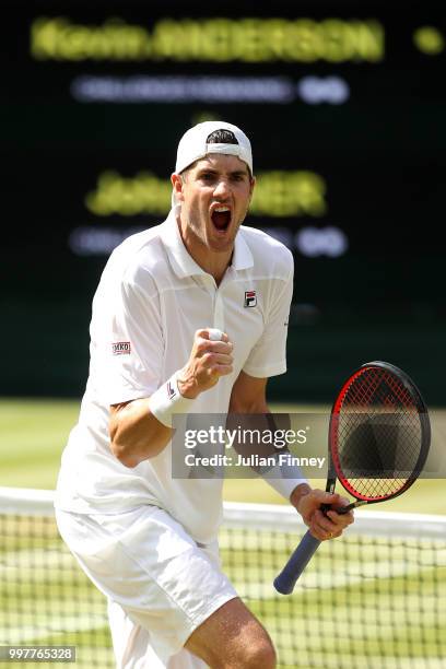 John Isner of The United States celebrates a point against Kevin Anderson of South Africa during their Men's Singles semi-final match on day eleven...