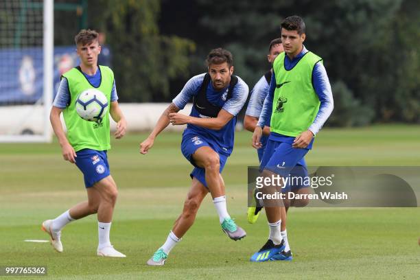 Cesc Fabregas and Alvaro Morata of Chelsea during a training session at Chelsea Training Ground on July 13, 2018 in Cobham, England.
