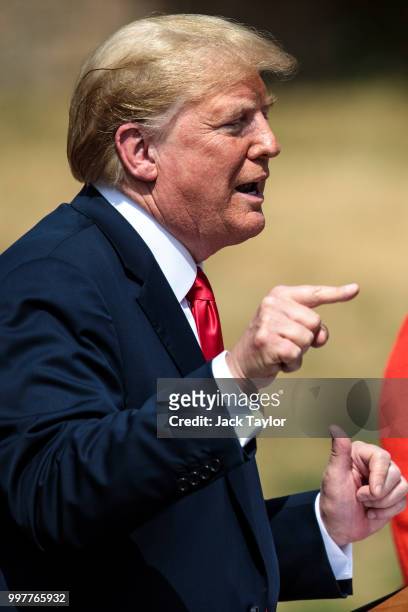 President Donald Trump attends a joint press conference with British Prime Minister Theresa May following their meeting at Chequers on July 13, 2018...