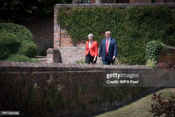 Prime Minister Theresa May and U.S. President Donald Trump attend a joint press conference following their meeting at Chequers on July 13, 2018 in...