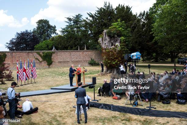 British Prime Minister Theresa May and U.S. President Donald Trump attend a joint press conference following their meeting at Chequers on July 13,...