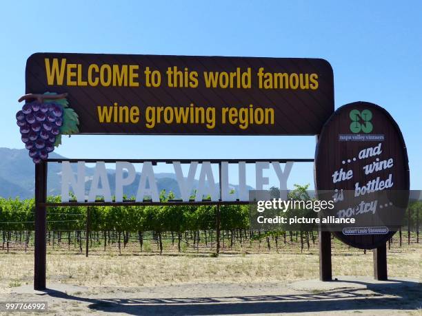 Sign that reads Welcome to this world famous wine growing region, NAPA VALLEY" is standing at the entrance of the wine region "Napa Valley" in Napa,...