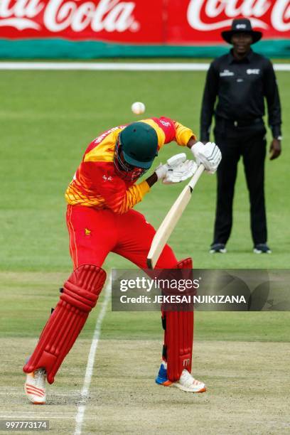 Zimbabwe's batsman Blessing Muzarabani ducks under a short ball during the first one day international cricket match between Pakistan and Zimbabwe at...