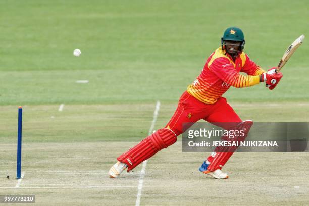 Zimbabwe's batsman Tendai Chatara plays a shot during the first one day international cricket match between Pakistan and Zimbabwe at Queens Sports...
