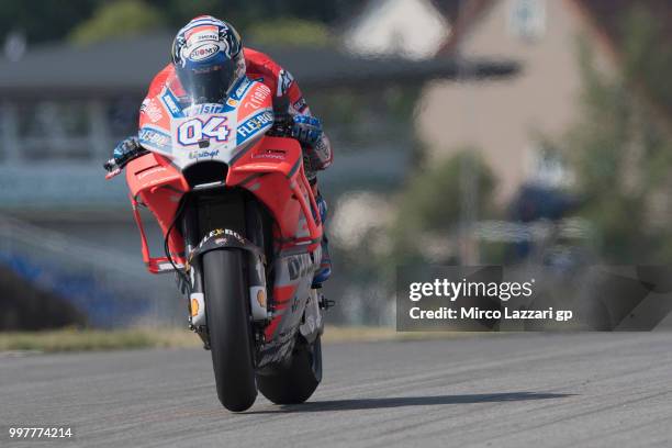 Andrea Dovizioso of Italy and Ducati Team heads down a straight during the MotoGp of Germany - Free Practice at Sachsenring Circuit on July 13, 2018...